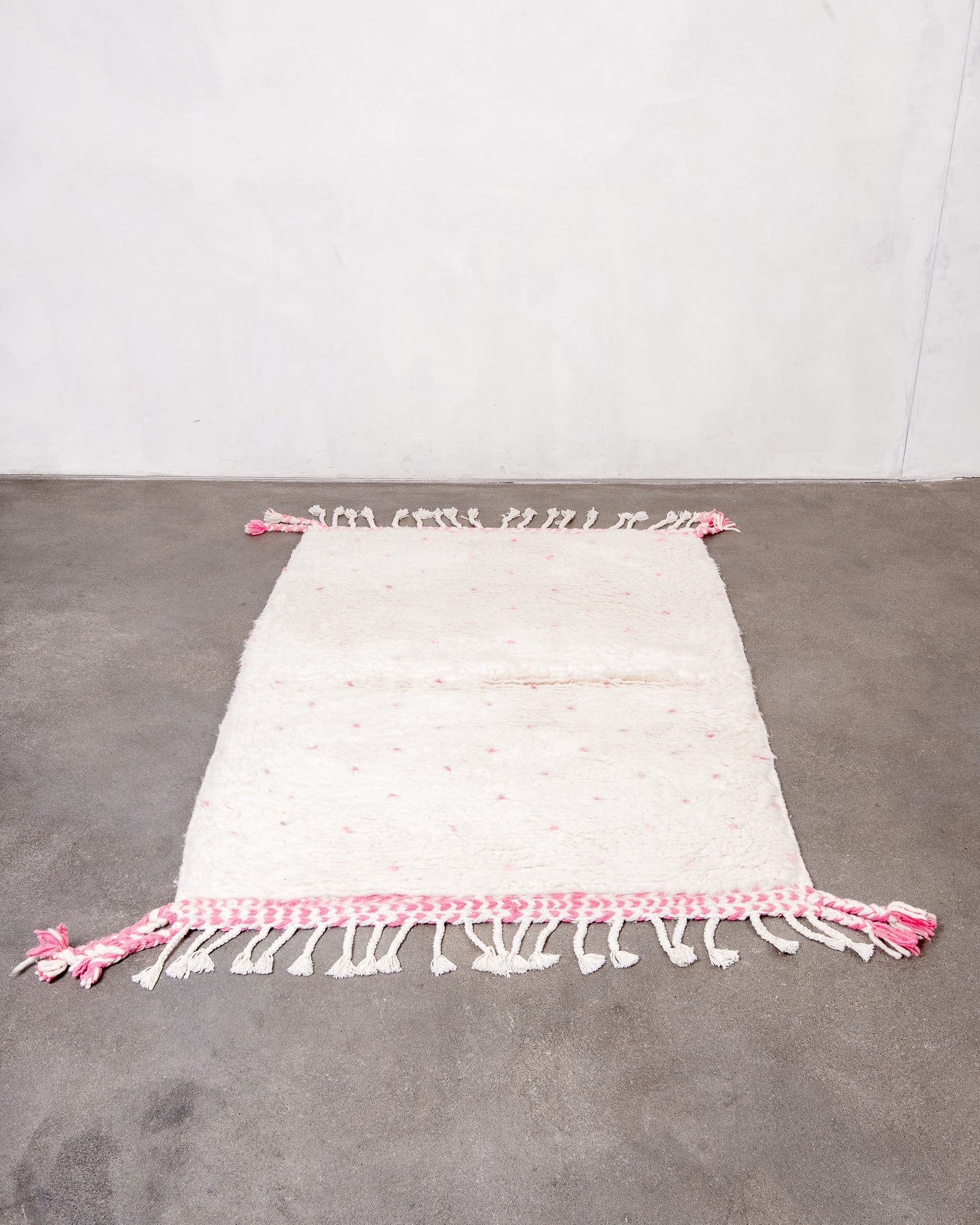 Modern, designer, handcrafted Berber rug from Morocco. Beniourain carpet with beautiful colours and patterns and fluffy wool texture.